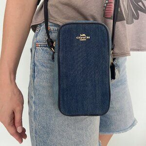 Coach denim crossbody phone bag.